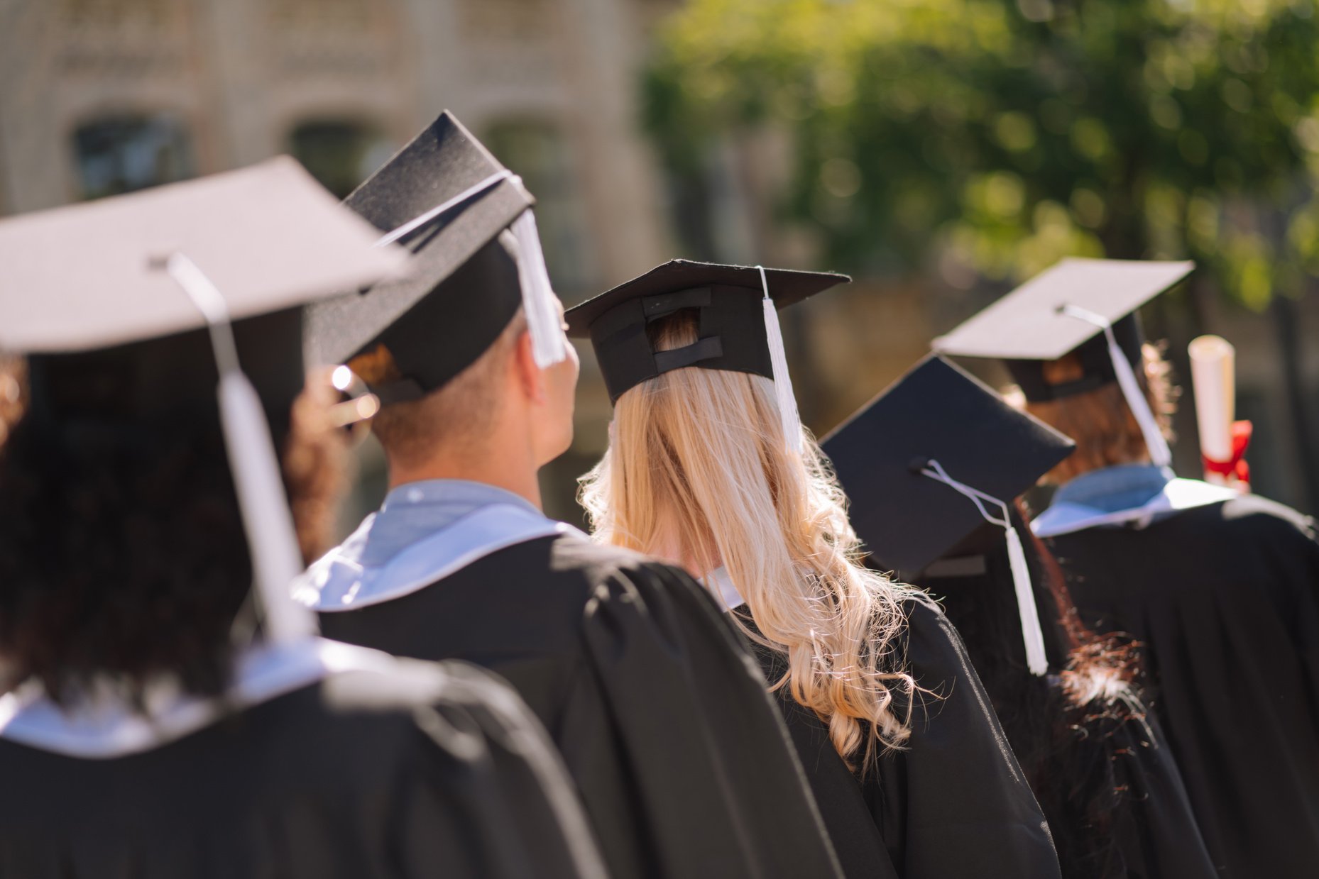 Graduates going away after receiving masters degree.