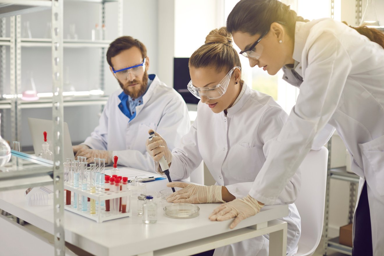 Group of Scientists Conducting an Experiment in a Pharma or Biotech Science Laboratory